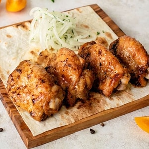 Фото товара 'Куриное бедро на мангале'
